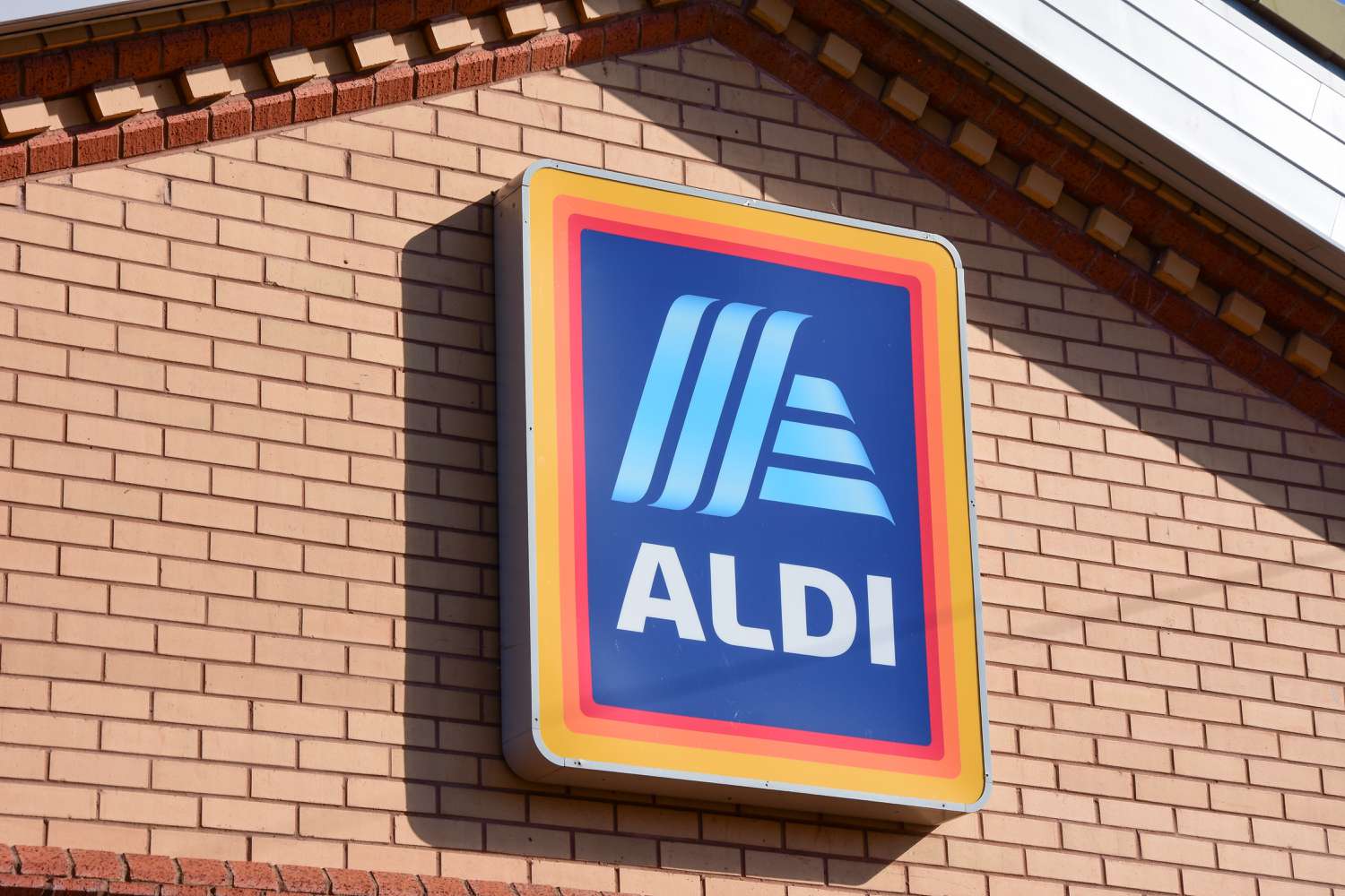 A sign with the company logo on an Aldi supermarket
