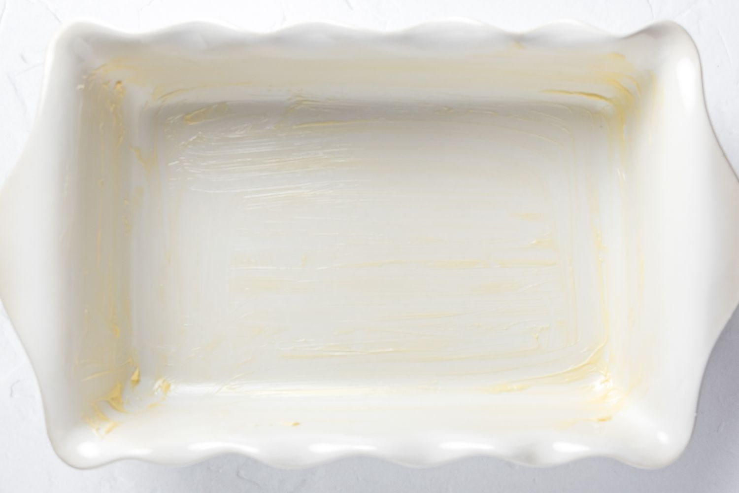 Casserole Dish Greased with Margarine for Vegan Mushroom Stuffing Recipe 