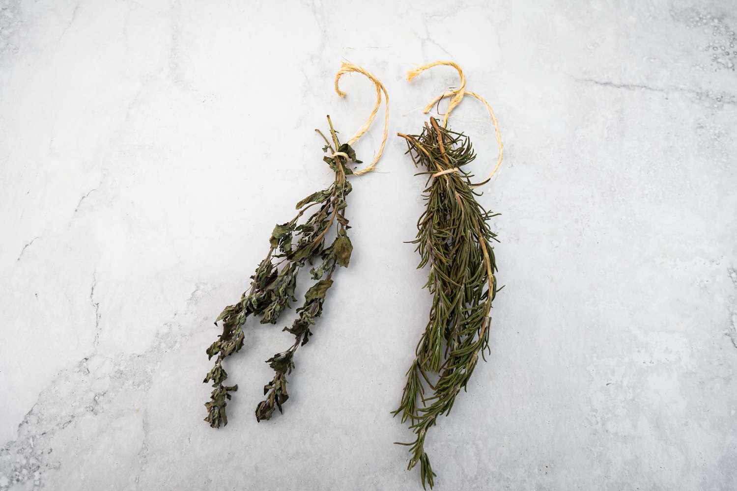 Sprigs of Dried Herbs (Oregano and Rosemary) Tied Together with Twine