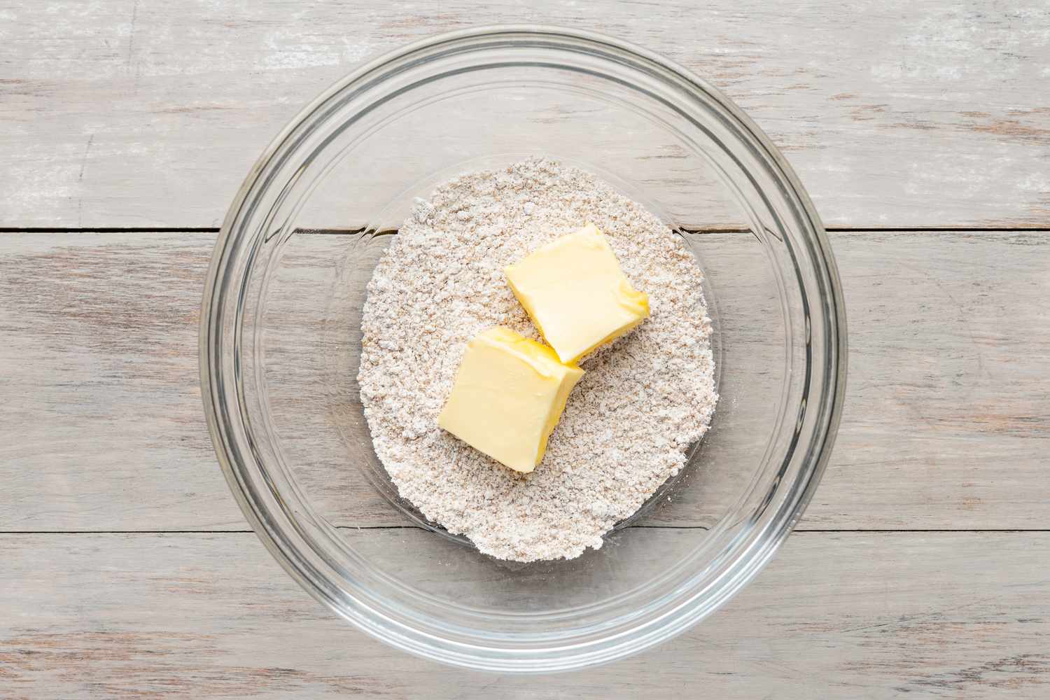 Butter Added to a Bowl After Sugar, Brown Sugar, and Cinnamon Are Mixed Together for the Streusel Layer