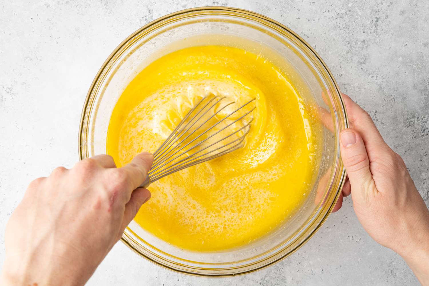 Wet Ingredients Whisked Together in a Bowl for 3-Layer Microwave Cake Recipe