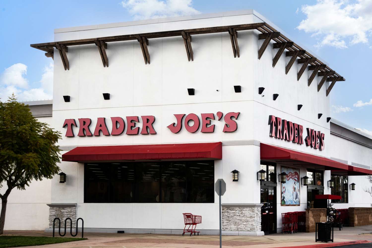 Exterior of a Trader Joe's store with visible signs and entrance