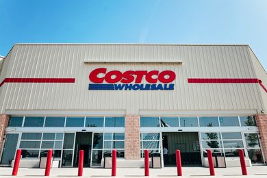 The exterior of a Costco Wholesale store with an entrance visible