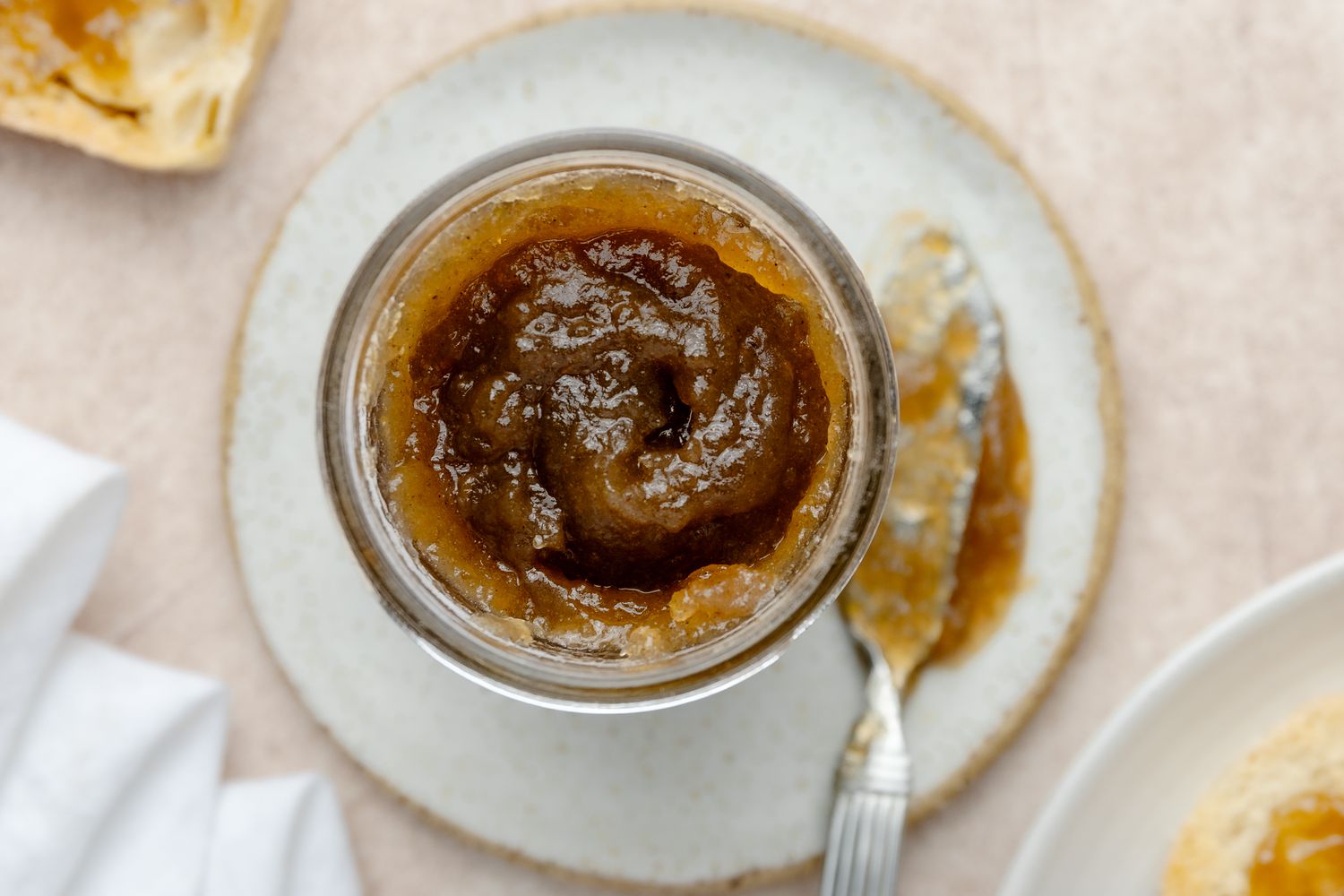 An overhead of apple Butter in a jar