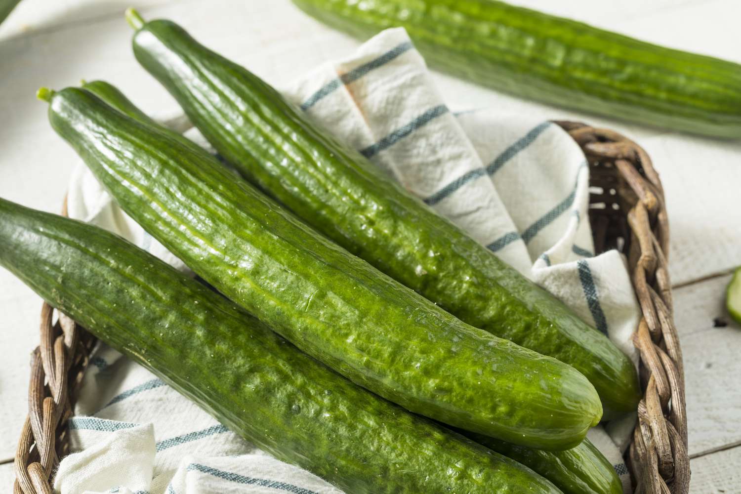 english cucumbers in basket