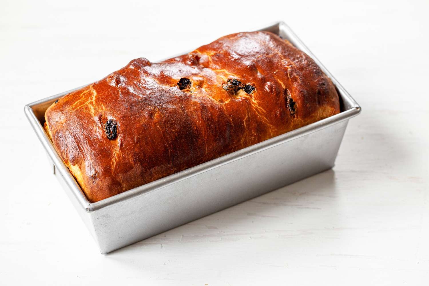 Baked Cinnamon Swirl Raisin Brioche Loaf in a Loaf Pan 