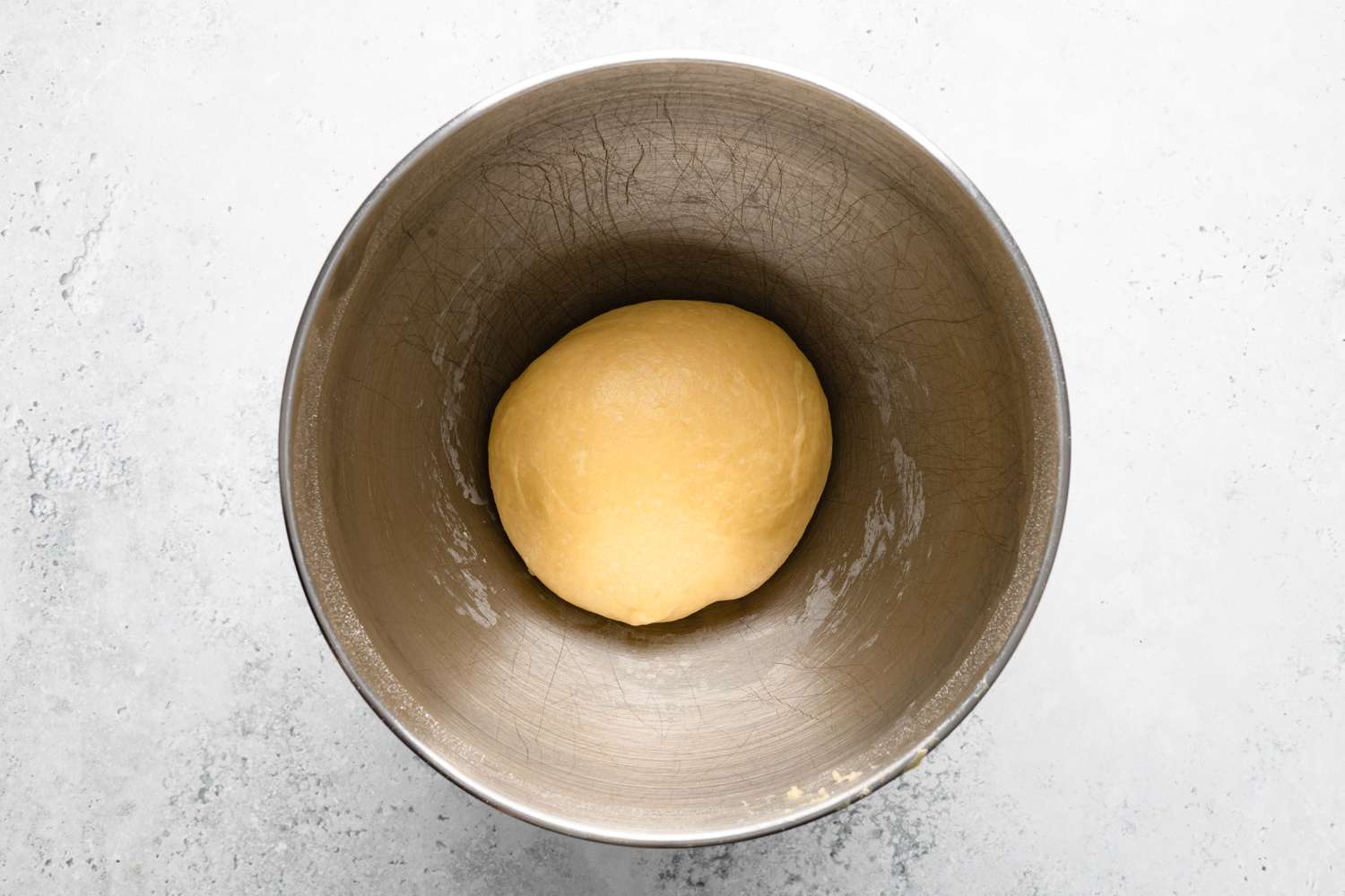 Smooth Bee Sting Cake Dough in a Mixing Bowl