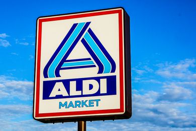 Aldi Market supermarket sign and a blue sky