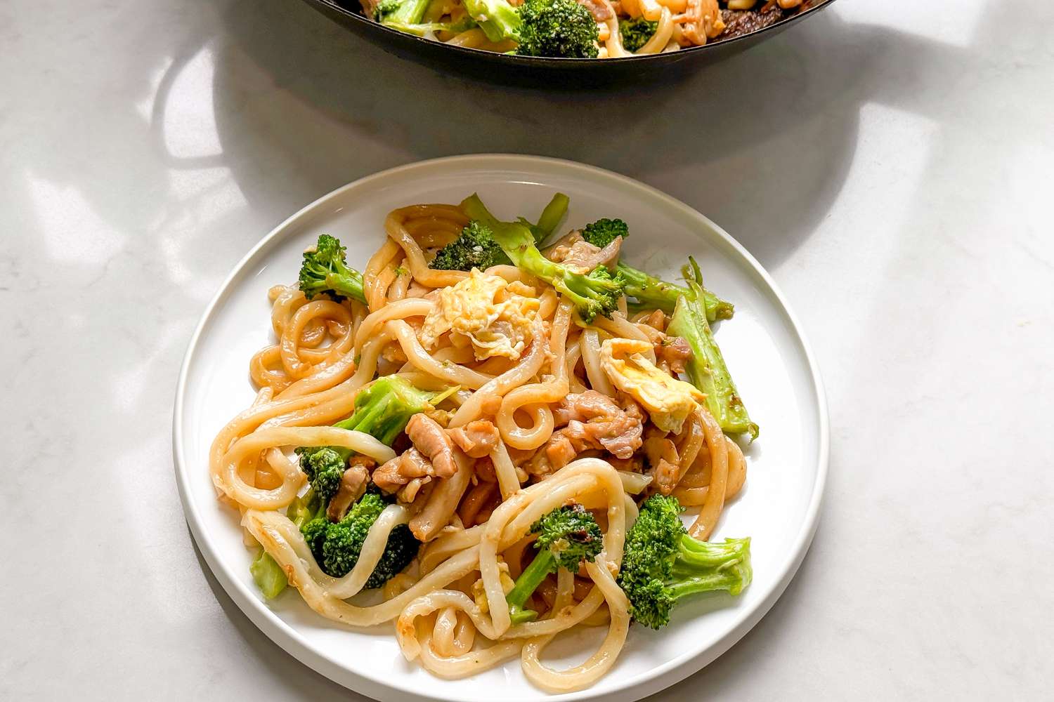 stir-fried noodles on a plate 
