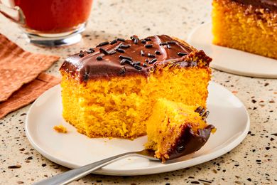 slice of Brazilian Carrot Cake on a plate with a fork