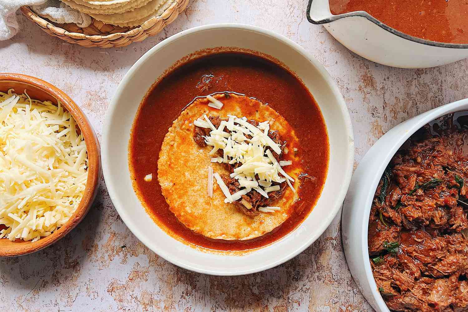 Soak Birria Tacos in Birria Sauce 