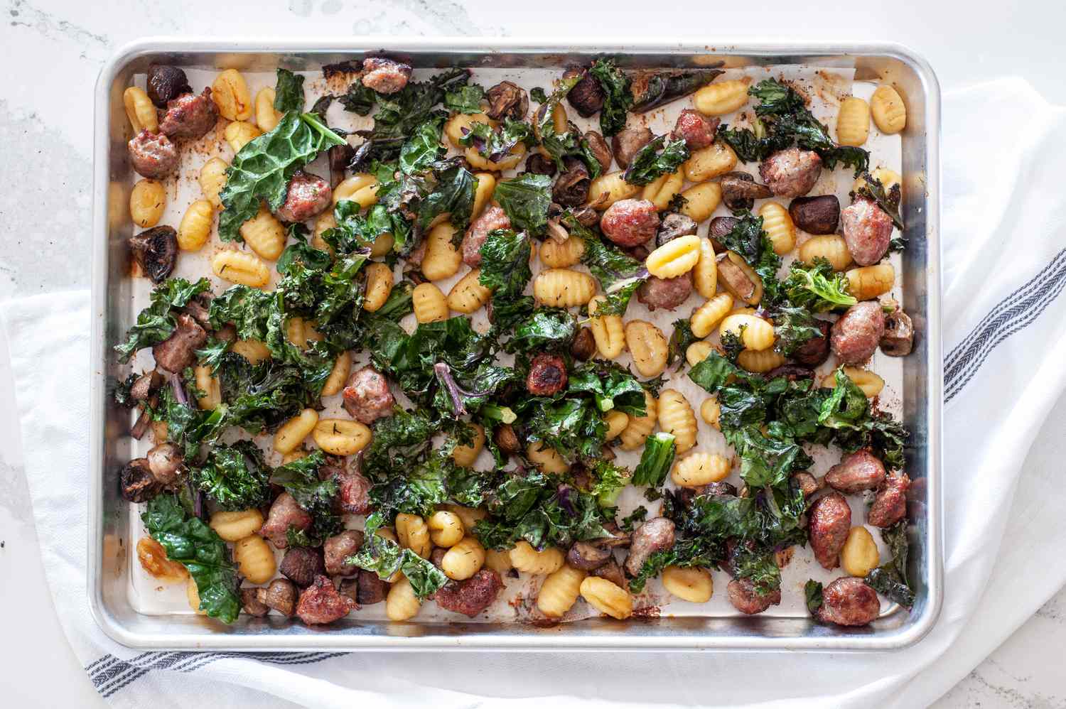 Sheet Pan Gnocchi With Mushrooms, Sausage, and Kale