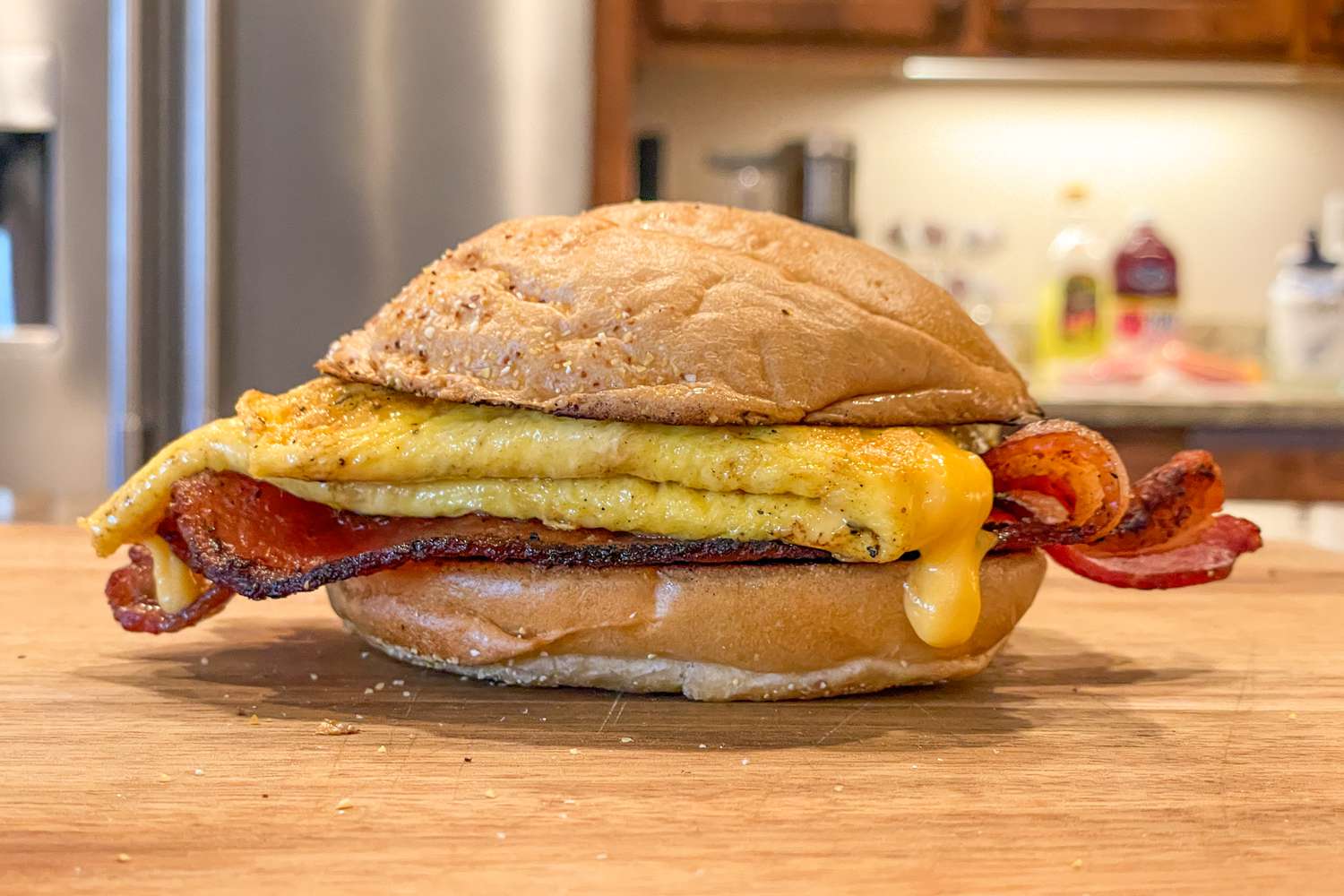 A bacon egg and cheese sandwich on a roll