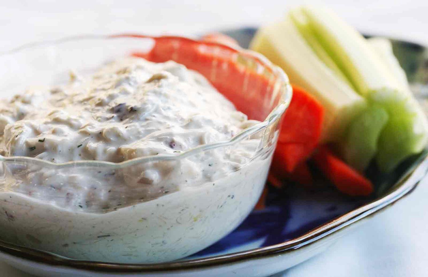 Crab Dip in bowl with veggies on the side