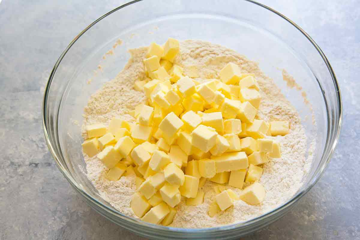 mix butter with flour to make pie dough for american flag pie