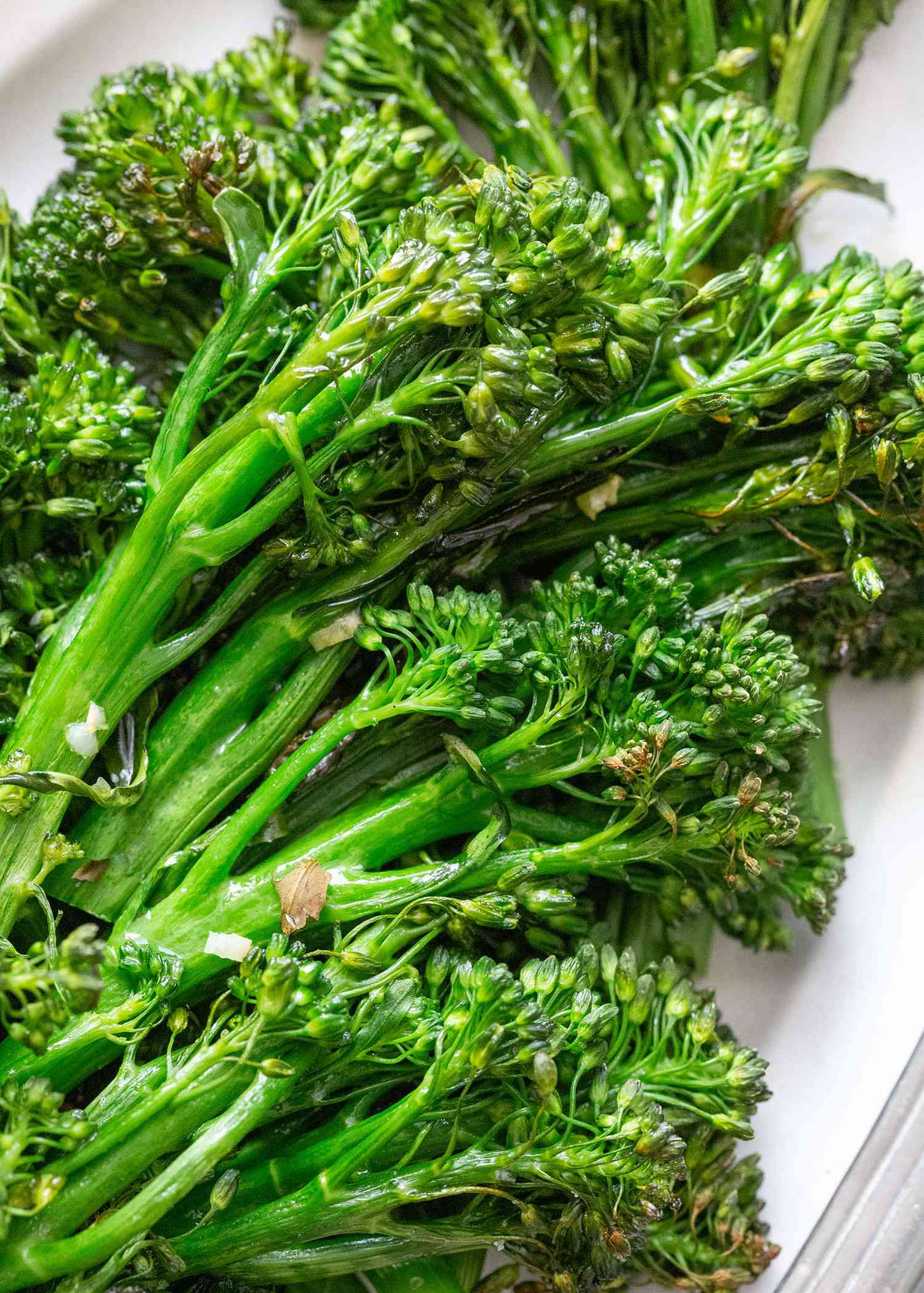 Broccolini roasted and set on a platter.
