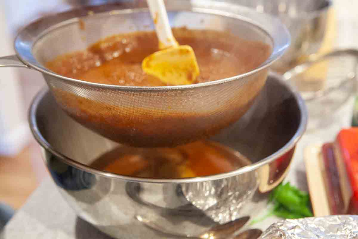 strain and reduce sauce for braised beef roast with red wine