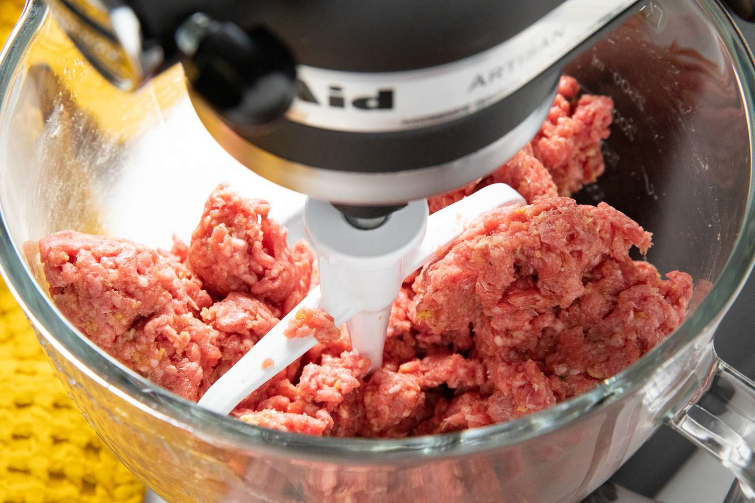 Easy Meatloaf Ingredients in a Stand Mixer Bowl Attached to a Stand Mixer
