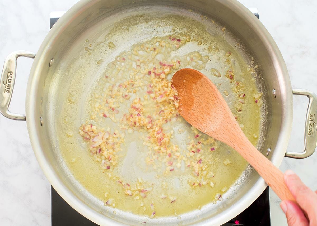 Wild Salmon with Angel Hair Pasta Recipe add the shallot and garlic