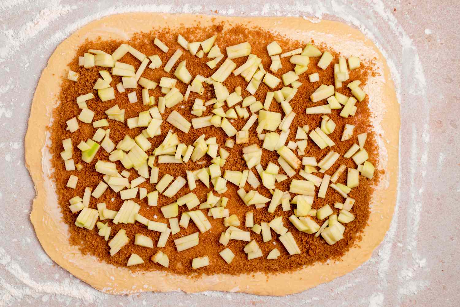 Filling Added to Dough Rolled Out on a Floured Surface