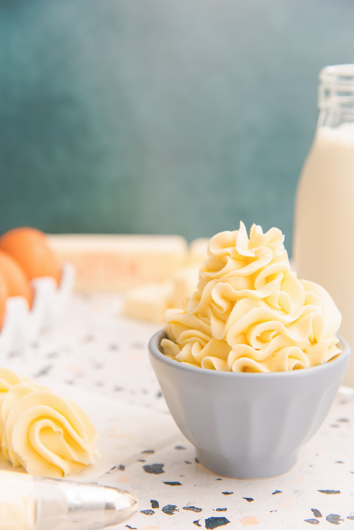Side view of the BEST German buttercream piped in a prep bowl.