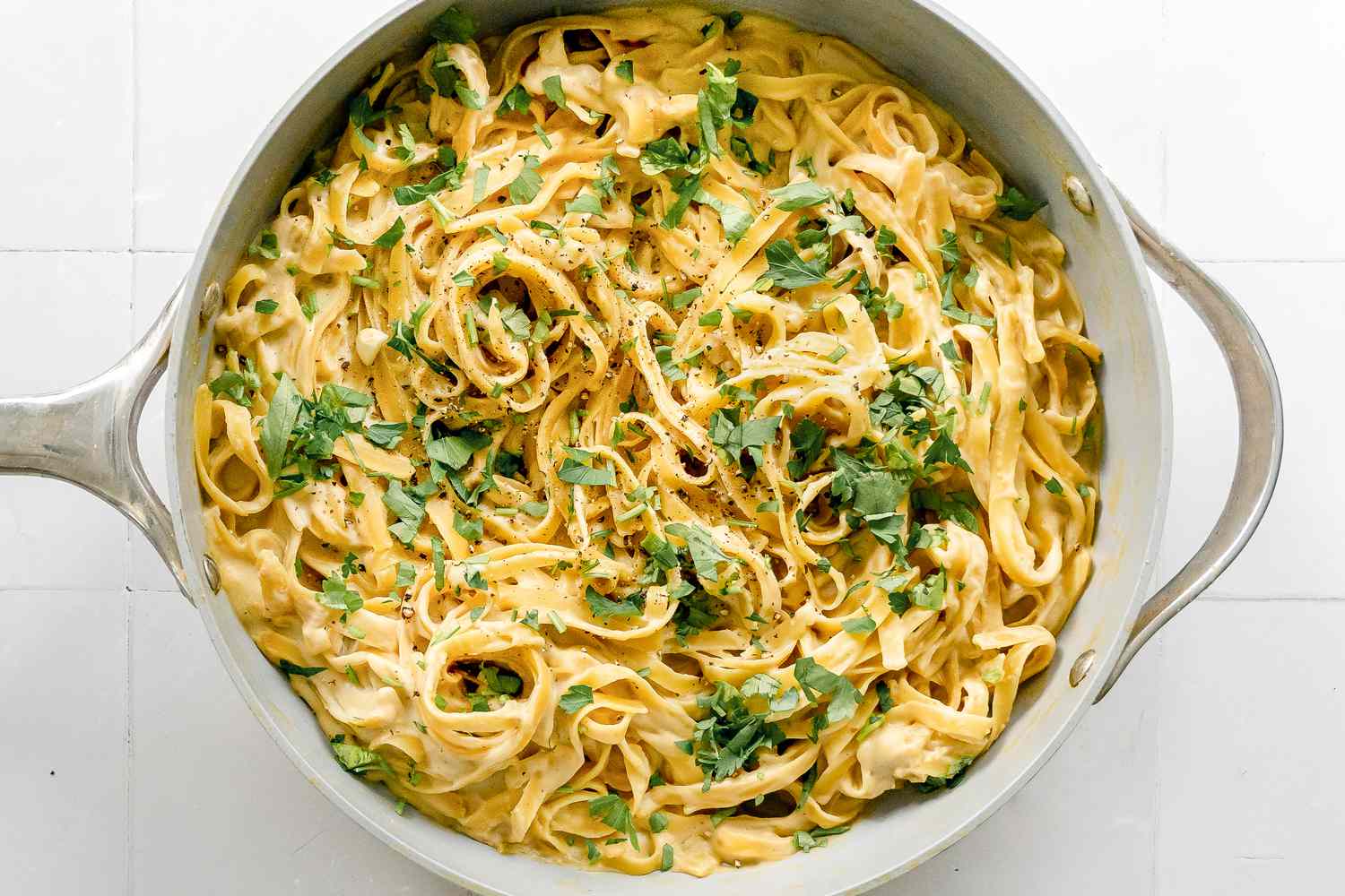 Super Creamy Vegan Pasta Topped with Black Pepper and Parsley