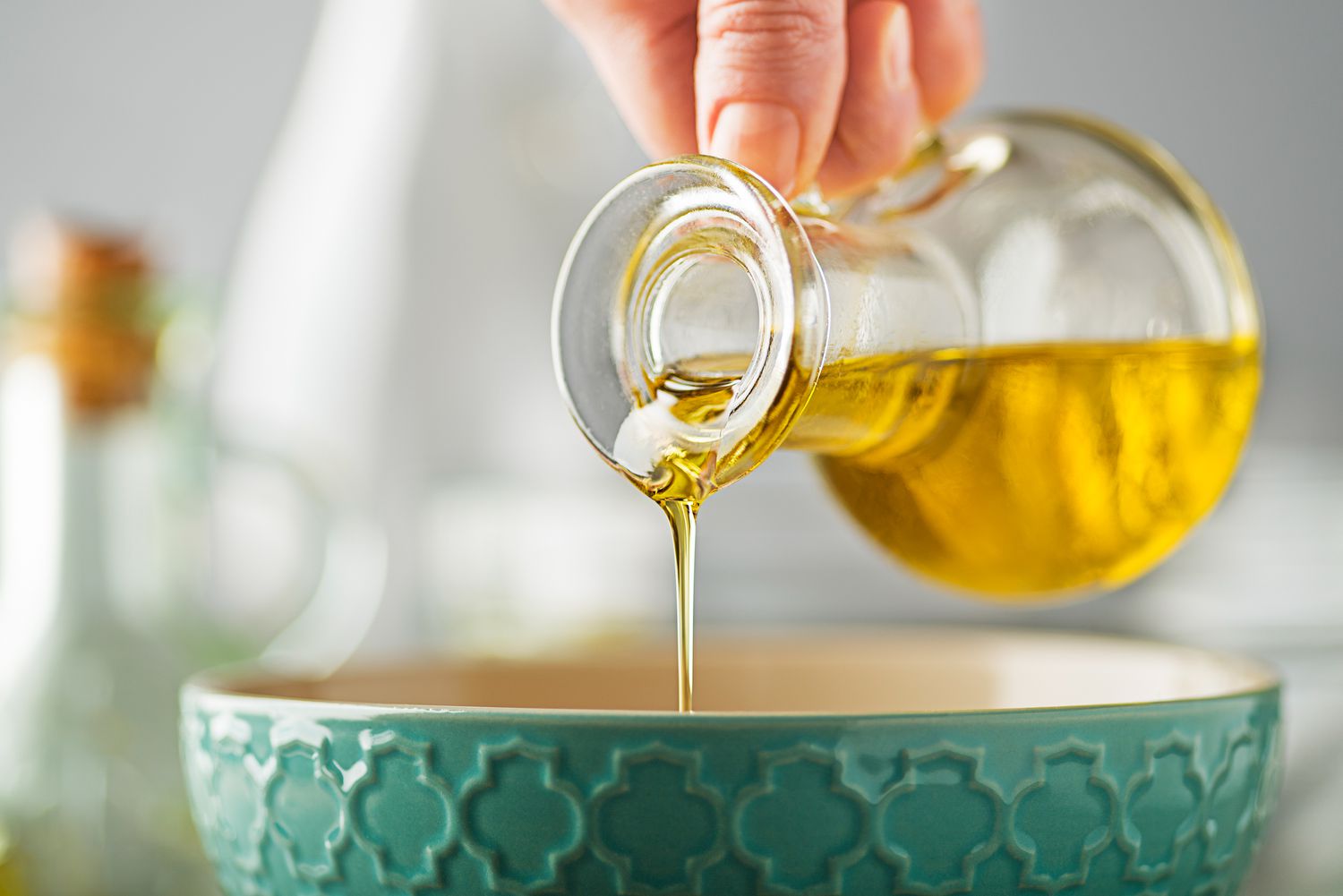 Olive oil poured into a bowl