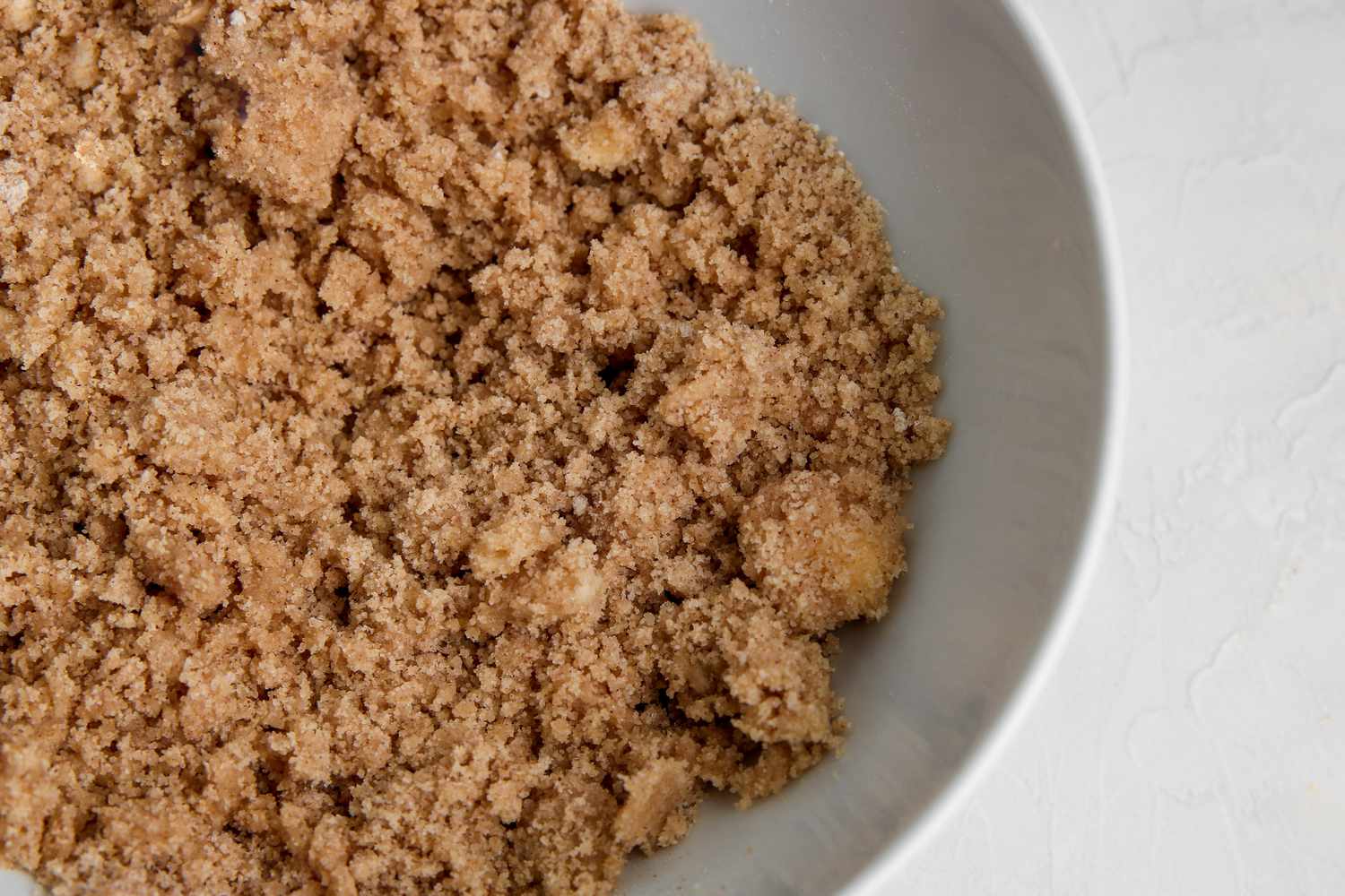 Making streusel for an easy homemade apple bread recipe.