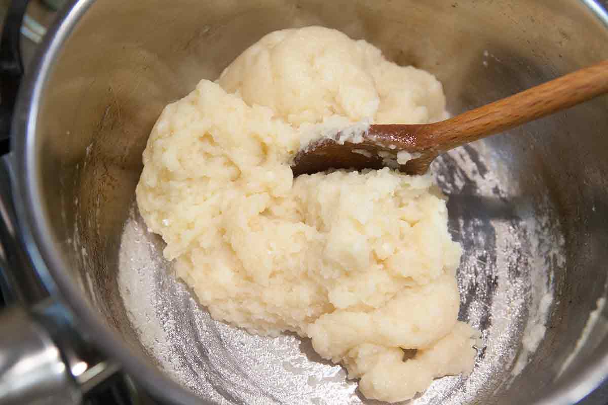 the cheese puff dough should pull away from the sides of the pan