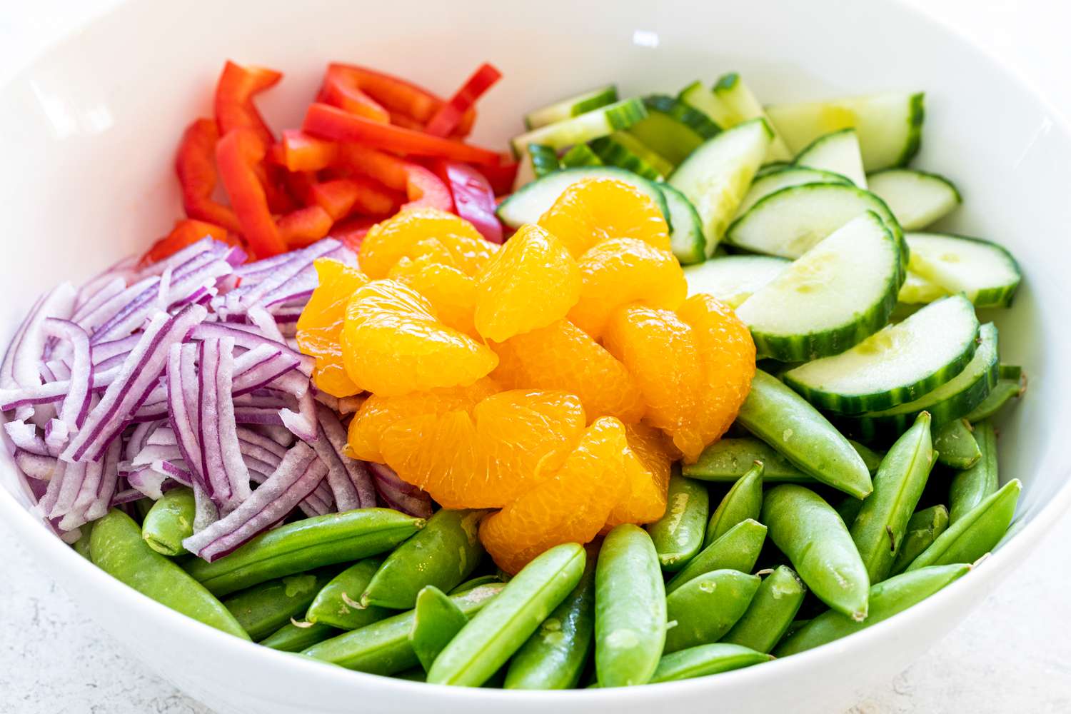 Combine vegetables and snap peas.