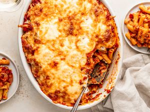 Casserole dish of cheesy baked ziti