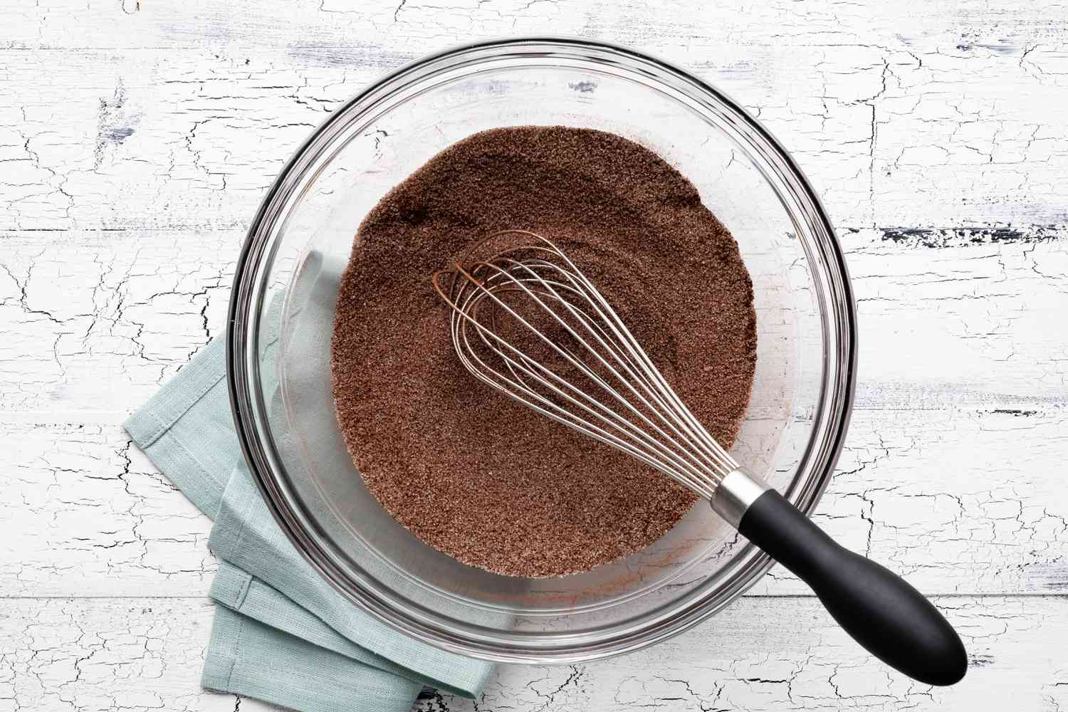 Sugar, Cocoa Powder, Espresso Powder, and Salt Whisked Together in a Bowl to Create Chocolate Chess Pie Filling