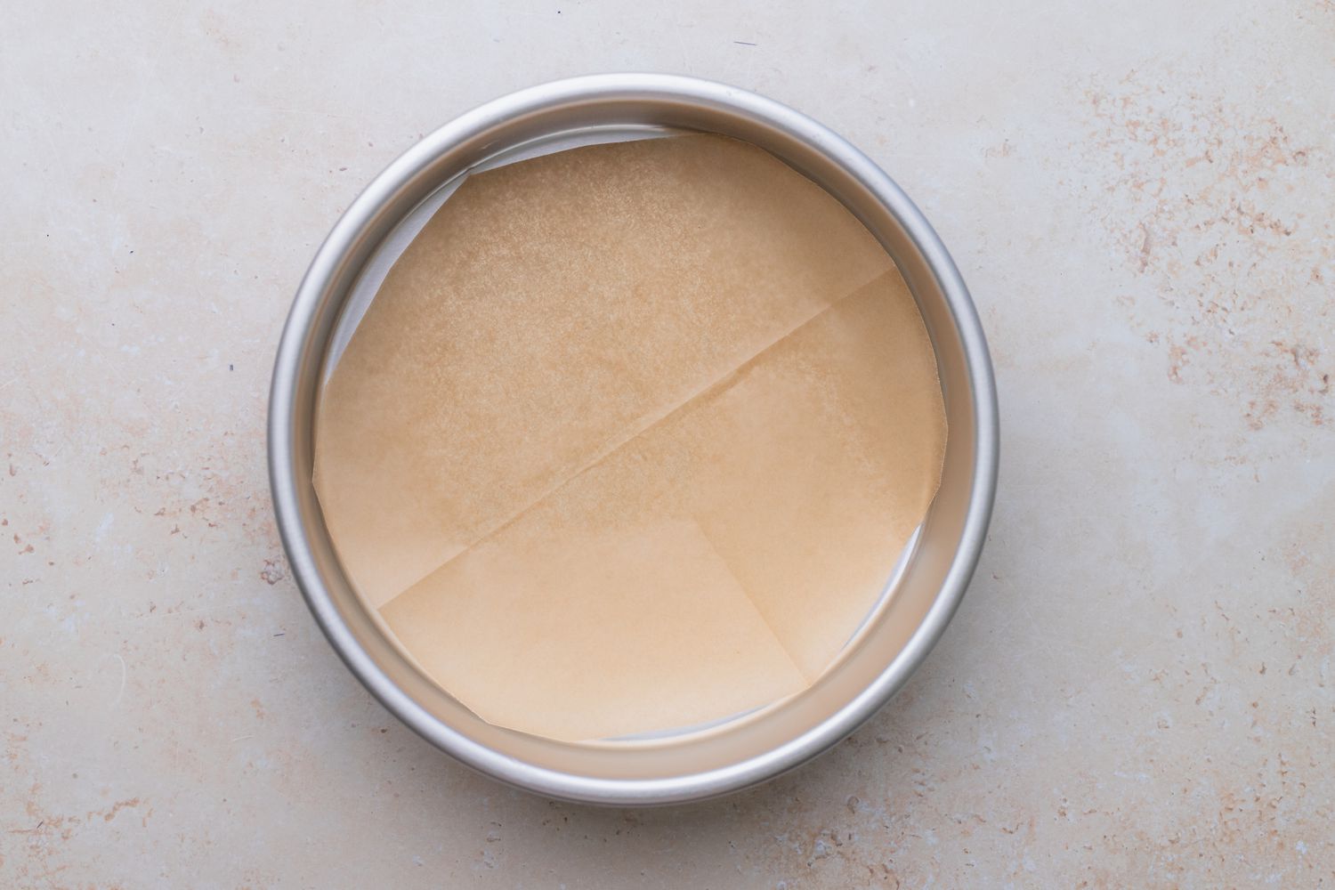 Parchment on Cake Pan for Rainbow Cake