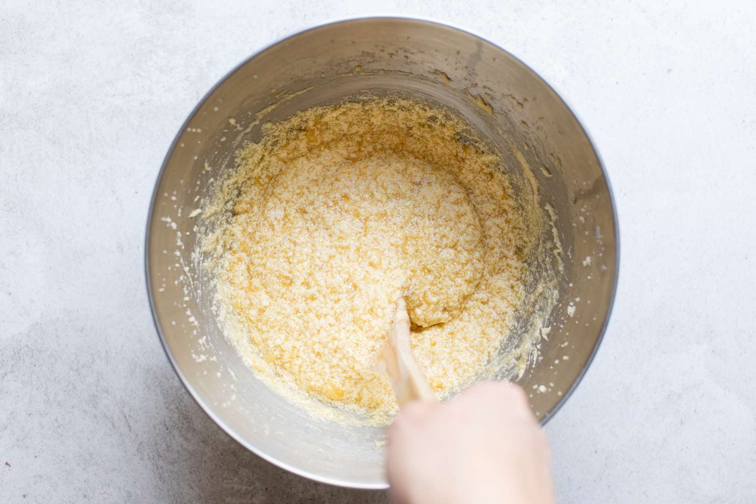 Bananas and Vanilla Extract Mixed into Sugar Mixture for Sheet Cake Recipe