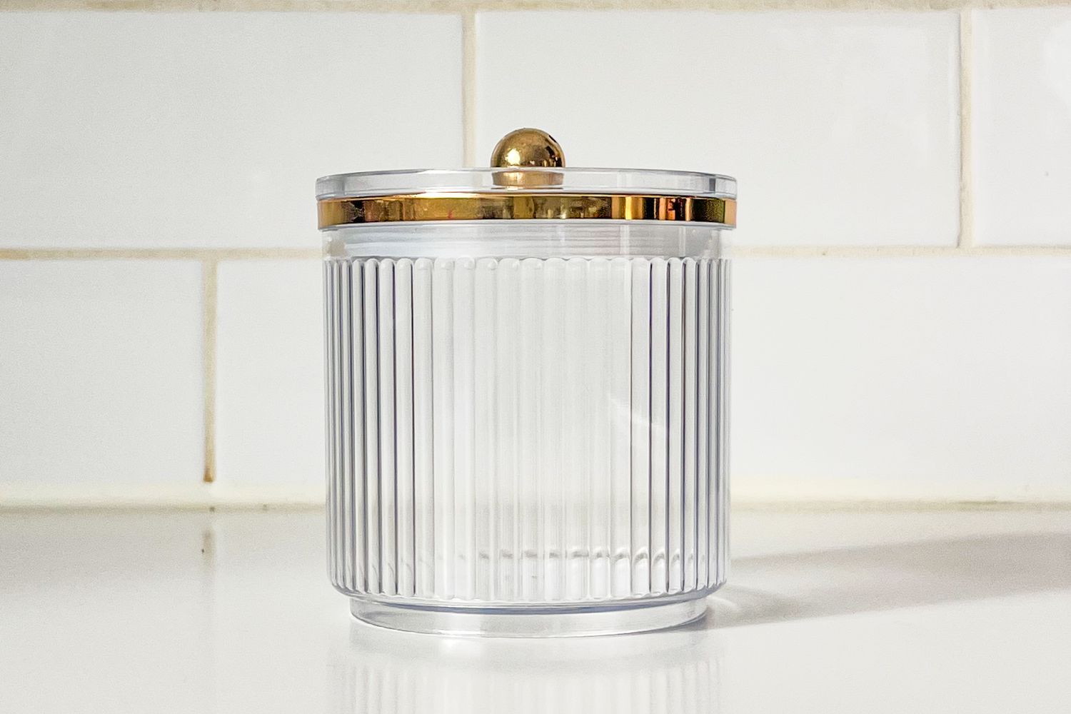 Dollar Tree acrylic canister with gold