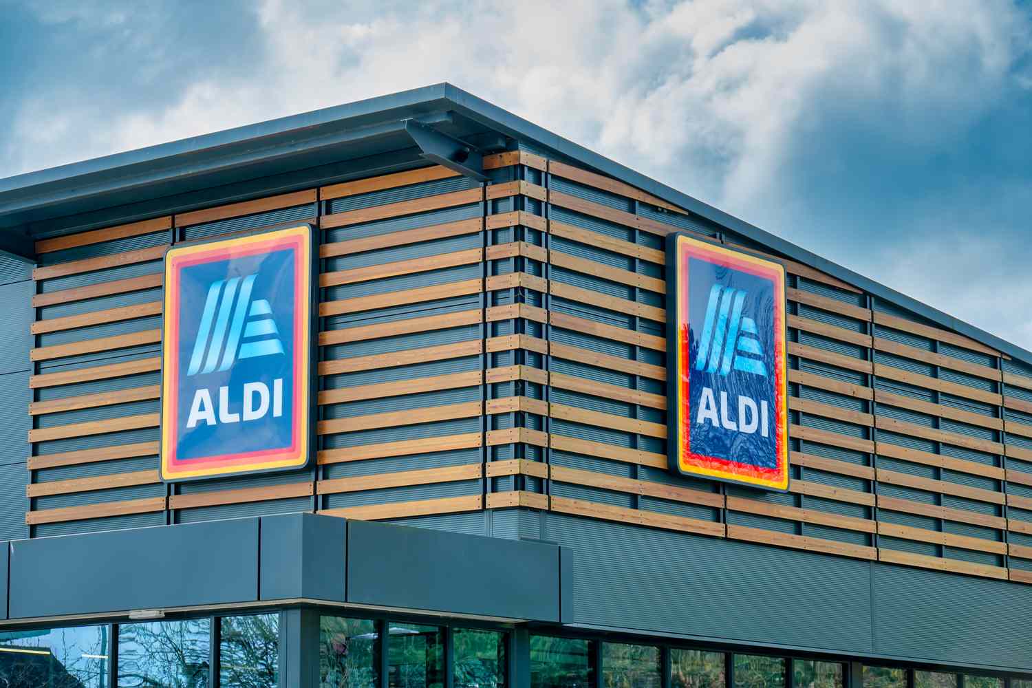 Exterior view of a modern Aldi store with prominent signage