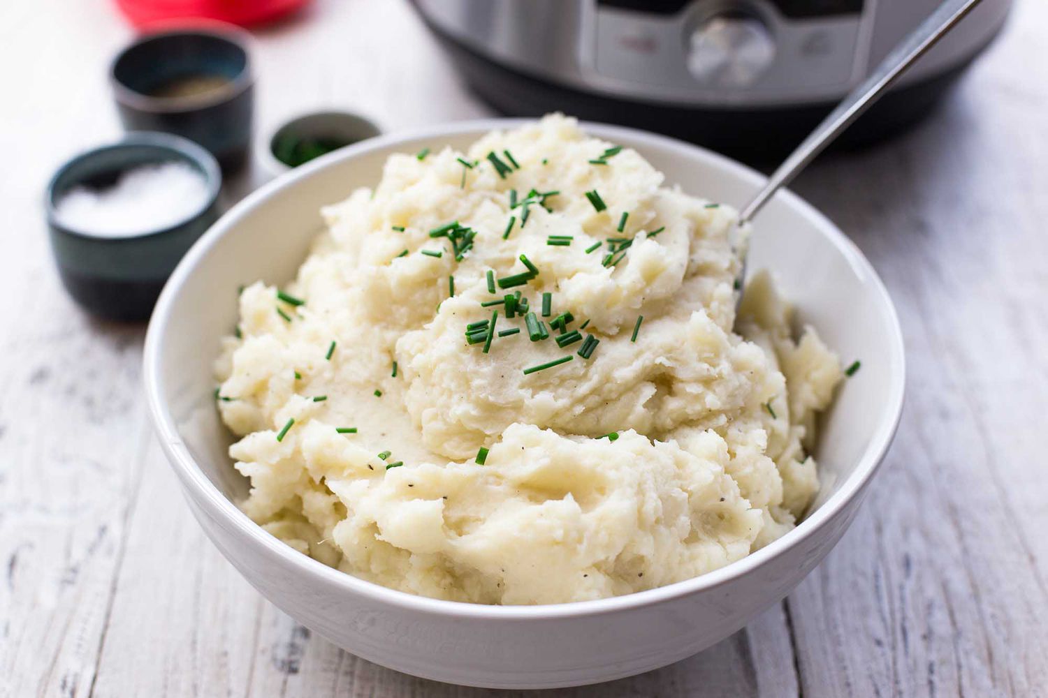 Instant Pot Mashed Potatoes in a bowl with chives