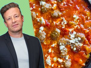 Jamie Oliver next to a dish containing meatballs and vegetables