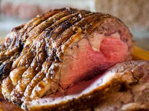 Sliced prime rib roast on a platter