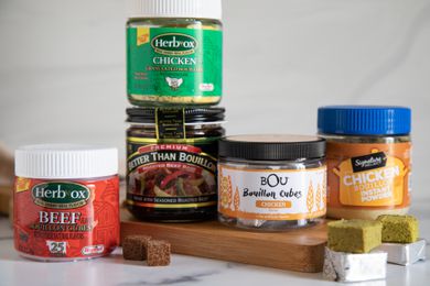 A collection of bouillon cubes, powder, and concentrates