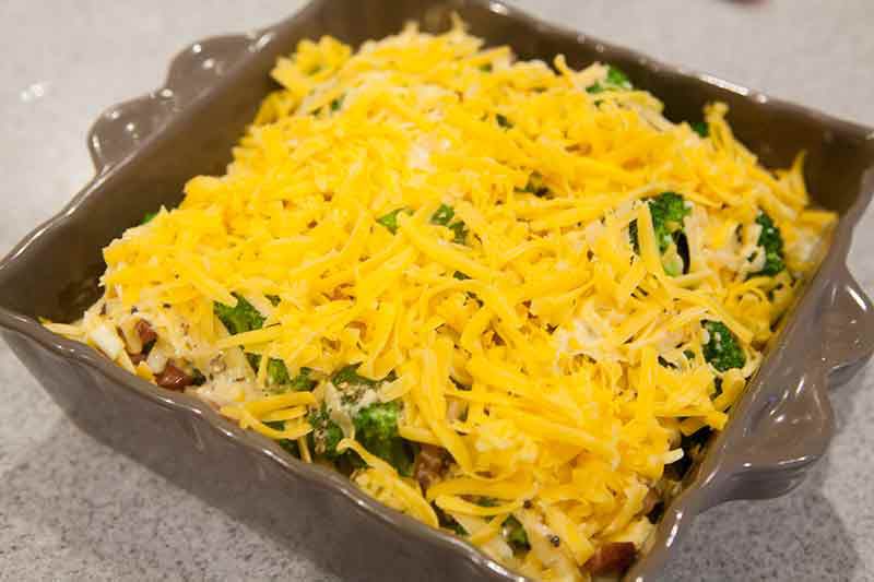 easy broccoli casserole covered in cheese 