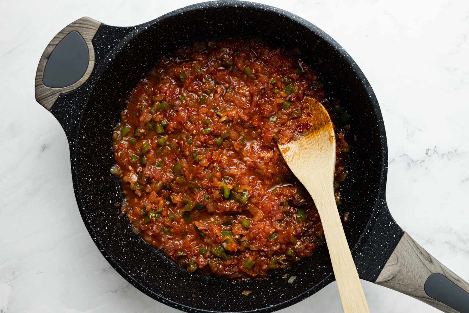 Tatli Biber Salçasi, Tomatoes, and Spices Added to Turkish Scrambled Eggs and Tomatoes