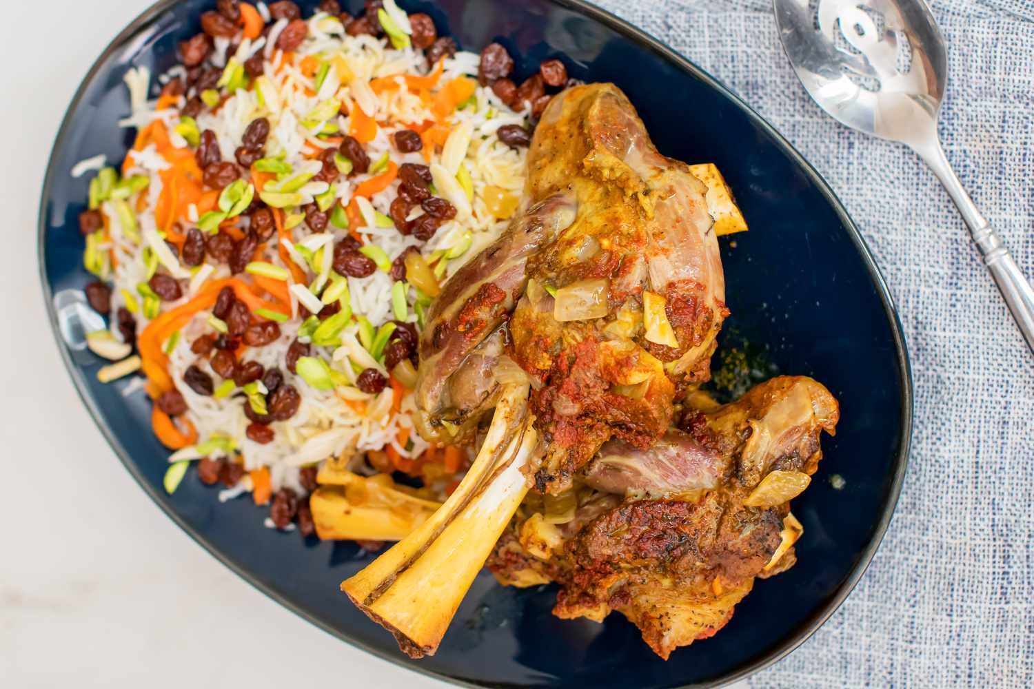 Kabuli Palao (Afghan Lamb Shanks with Rice, Carrots, and Raisins)
