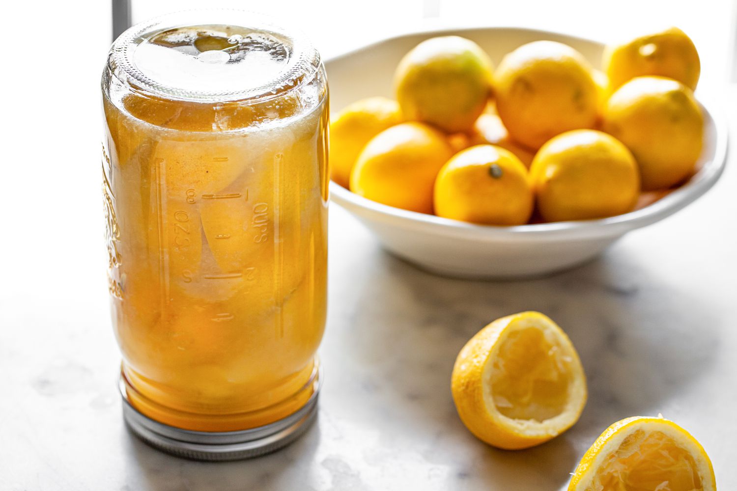 Lemon Jar Resting on Counter, Upside Down for Preserved Lemons