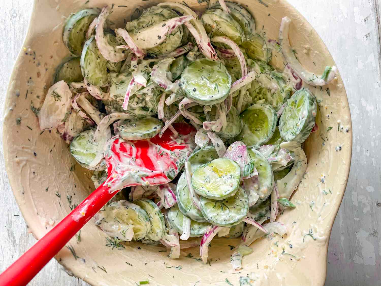 Spatula Used to Mix Everything Bagel Cucumber Salad Ingredients