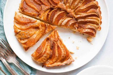 Pear cake on a white plate.