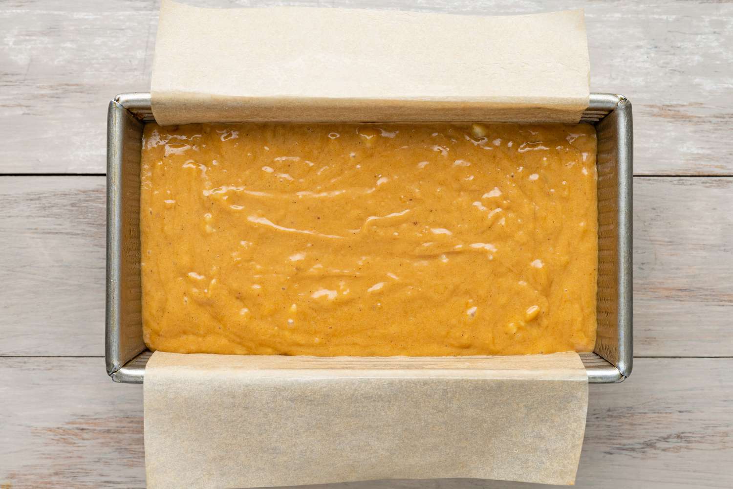 Spiced Dulce de Leche Banana Bread Added to Lined Bread Pan