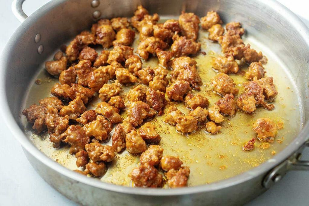 Brown sausage for Sausage and Kale Skillet Dinner recipe