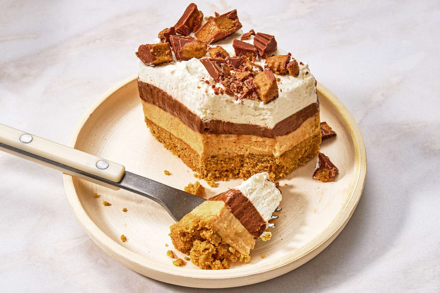 1 serving of Chocolate-Peanut Butter Delight on a plate with a fork