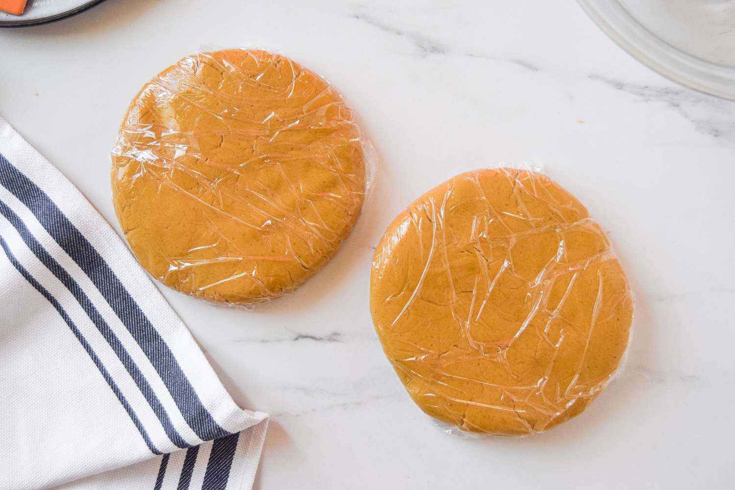 Dough Flattened into Two Disks and Plastic Wrapped for Stained Glass Cookies